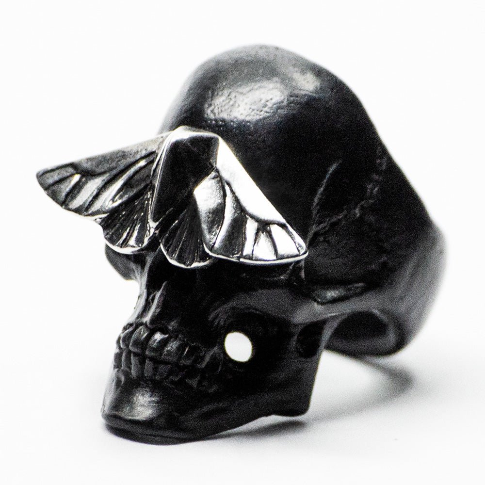 Skull & Moth ring - black variant - semi side view on a white background