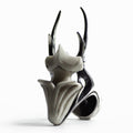 The Stag Beetle Ring - white variant - on a white surface, all details of the ring are clearly visible