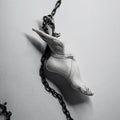 Talaria pendant - hand crafted in white marble and sterling silver depicting a foot with a winged Hermes or Mercurius sandal 