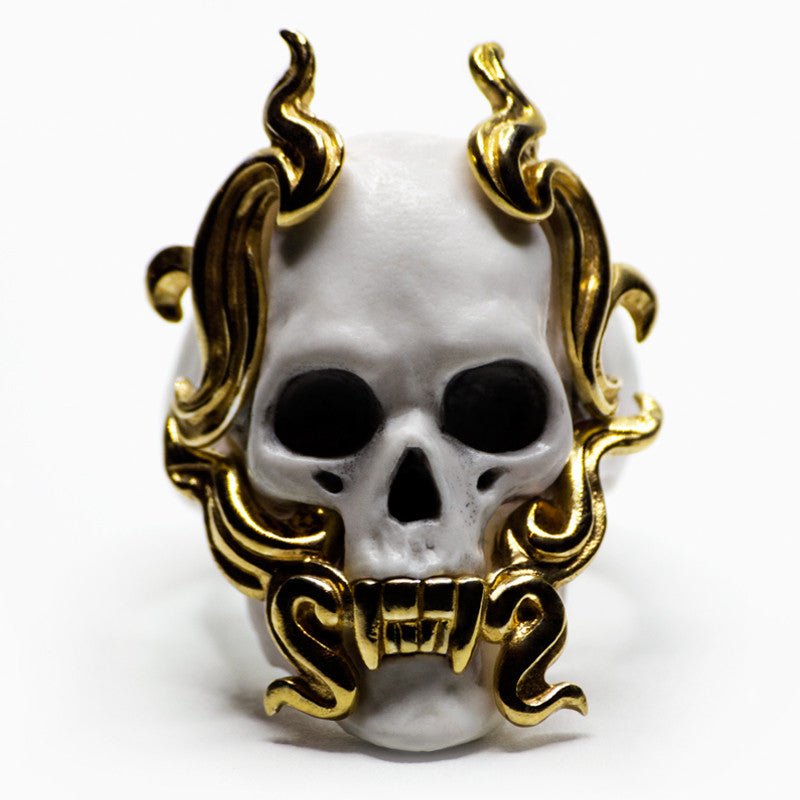 Mayla Skull ring - front view, gilded sterling silver flames and fangs are clearly visible